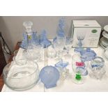Glassware to include blue glass dressing table items, a figural centre piece, glasses, decanter
