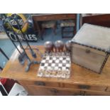 An Argentinian pony skin chess board together with resin American Indian pieces, three vintage