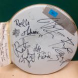 A 1988 signed Remo Ambassador drumhead with signatures by all the band members of Alien Sex Fiend at