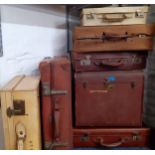 A collection of vintage suitcases to include leather examples and a trunk Location:BWR