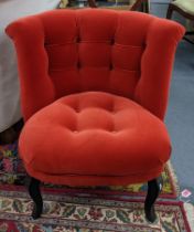 A modern Oliver Bonas button back upholstered bedroom chair Location: