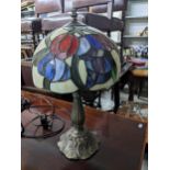 A modern Tiffany style table lamp with stained glass shade Location: