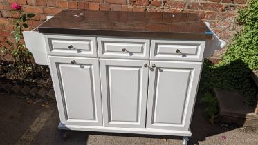 A modern kitchen unit having towel rails, drawers and cupboard doors 94.5 x 130 w Location: