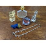 A group of glassware to include a French Brousseau frosted glass perfume bottle, Caithness