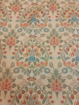 A bolt of vintage floral upholstery fabric having a pale yellow ground with floral sprays, 138cm