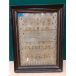 An 1816 sampler worked by Ann Colby with written verse 'Love to God', the alphabet and images of