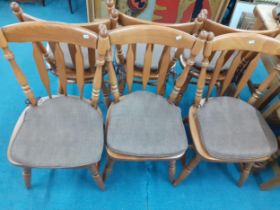 A set of 6 modern elm kitchen chairs with slat backs and removable brown cushions Location: A3M