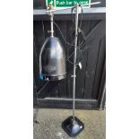 A vintage camera Company Vauxhall adjustable tabletop work lamp, having a black painted shade and