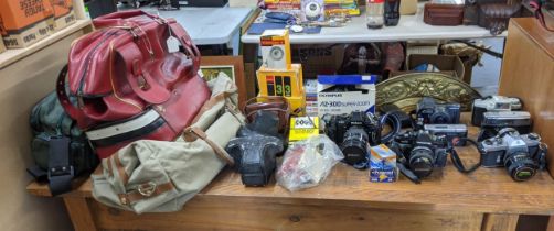 Photographic equipment and accessories, to include, a Nikon F-501, Asati Pentax Spotmatic, Olympus