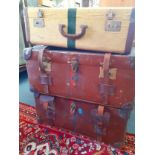 Two early 20th Century Pukka leather trunks with leather straps A/F having removable trays, one with