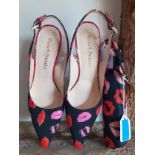 Russell & Bromley- A pair of black fabric and leather Vero Cuoio stilettos having a pink and red
