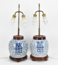 A near pair of Chinese blue and white porcelain double happiness ginger jars, late 19th century,