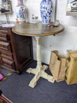A mid/late 20th century bistro table raised on a cream painted base Location:
