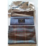 Three samples of vintage Pringle fabric in different designs to include tweed and tartan purchased