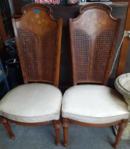 A pair of Sklar inlaid walnut chairs Location: