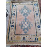 An Tajikistan style cream ground rug Location: RAF