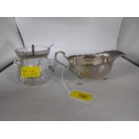 A silver sauce boat and a glass jar with silver lid and spoon, mixed marks to include Walker &