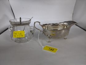 A silver sauce boat and a glass jar with silver lid and spoon, mixed marks to include Walker &