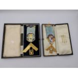A pair of cased Masonic medals to include a 9ct gold and enamel Orion Lodge example with 9ct gold