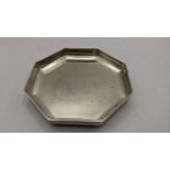 A 1930's silver octagonal shaped pin dish, hallmarked London 1937, 184.5g Location: