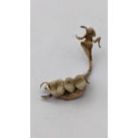 A gold plate with four teeth, 10g Location: