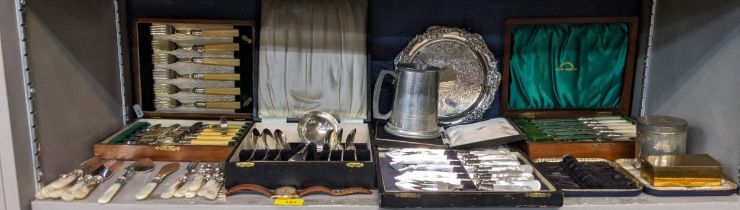 Silver plate and pewter to include cased sets of cutlery, a set on mother of pearl handles, also