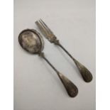 A silver fork and serving spoon, possibly Dutch, both with ornately decorated handles and rope twist