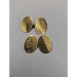 A pair of 9ct gold cuff links, engraved with initials, 4.7g Location: