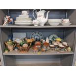 A mixed lot of ceramics to include a group of character jug /teapots to include Beswick, Lingard and