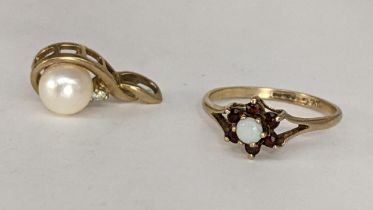 A 9ct gold garnet and opal cluster ring, 1.4g together with a 9ct gold diamond and pearl pendant,