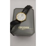 A Longines Presence 9ct gold gents quartz watch, with original Longines box Location: