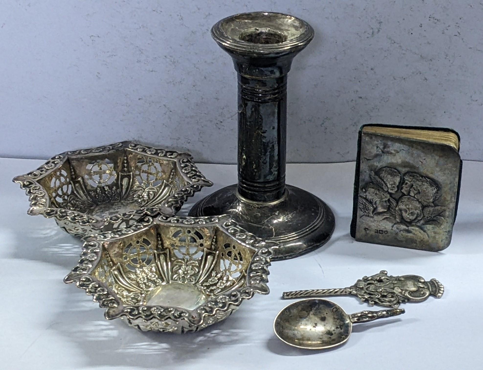 Mixed silver and white metal items to include a pair of pierced dishes, silver miniature notebook