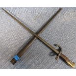 An 1874 pattern French bayonet for the Gras rifle, together with scabbard. Scabbard and hilt stamped