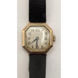 An early 20th century 9ct gold ladies manual wind wristwatch on a black leather strap Location: