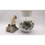 A Royal Copenhagen figure of a fawn riding a tortoise, numbered 858, together with a Meissen vase,