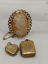 A 9ct gold cameo brooch, together with two 9ct gold lockets, total weight 10g Location: