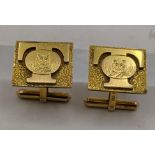 A pair of 14ct gold cuff links engraved with a tiger, total weight 18.6g Location:
