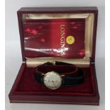 A Longines 9ct gold gents manual wind wristwatch with box and guarantee Location: