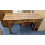 A pine and bamboo side table having two drawers and on block shaped legs Location: