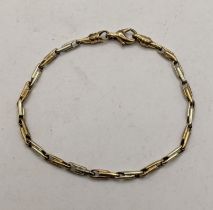 A 9ct two tone bracelet, total weight 7g Location: