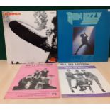 A small mixed music related lot containing a Led Zeppelin I LP, matrix ATL 40 031 (good, no
