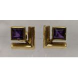 A pair of 18ct gold earring inset with square cut amethysts, total weight 4.6g Location: