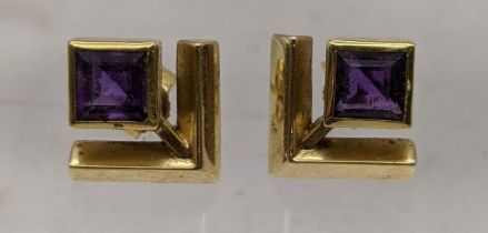 A pair of 18ct gold earring inset with square cut amethysts, total weight 4.6g Location: