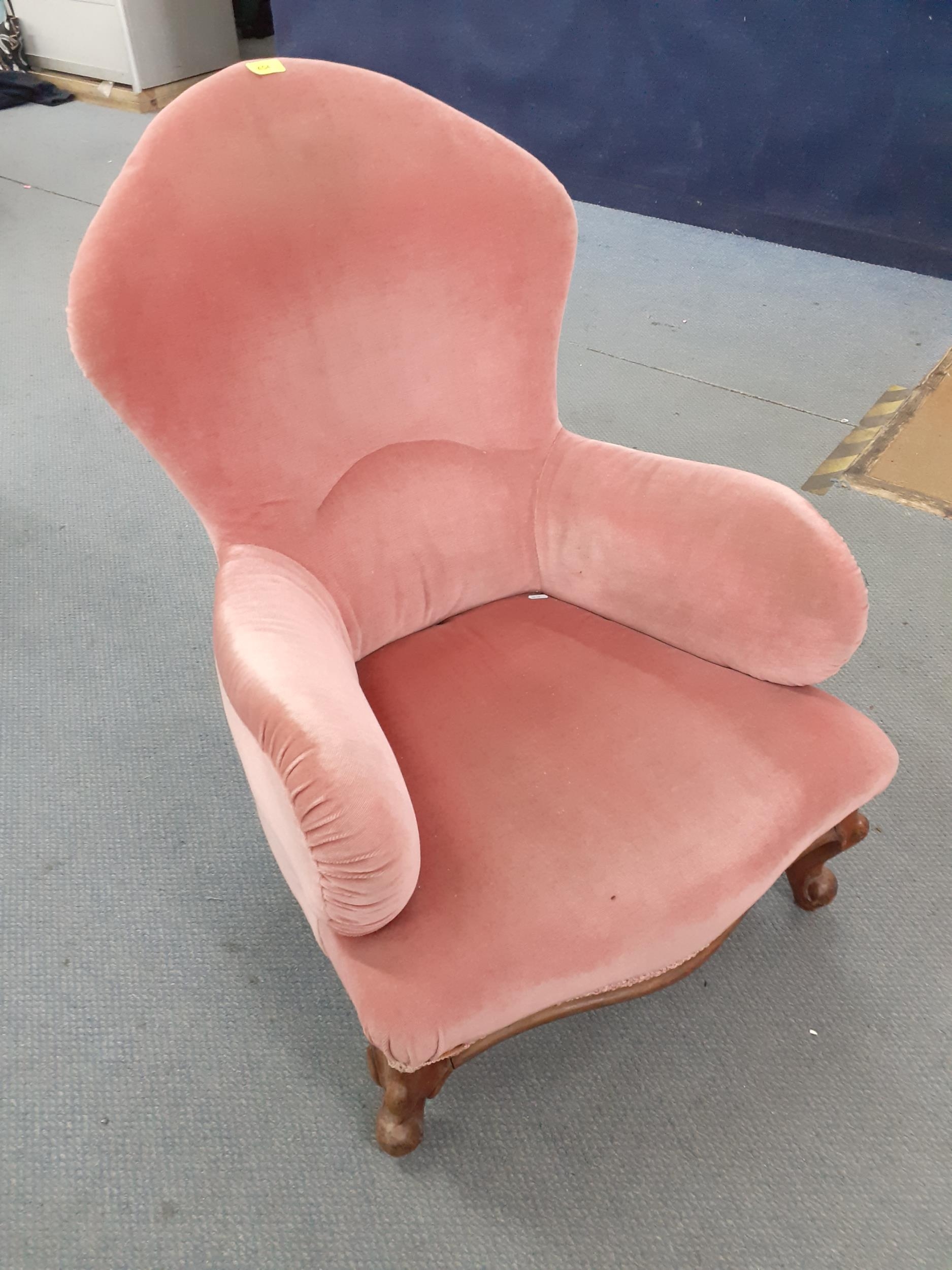A Victorian pink upholstered nursing chair on front beech cabriole legs Location: RAM