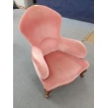 A Victorian pink upholstered nursing chair on front beech cabriole legs Location: RAM