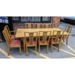 A modern light oak dining table and matching chairs by Batheaston Chairmakers of Corsham