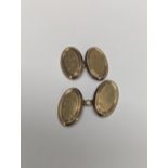 A pair of 9ct gold cuff links, engraved with initials, 3.1g Location: