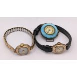 Two ladies 9ct gold watches together with an early 20th century silver and enamelled watch Location: