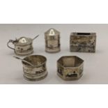 A collection of Middle Eastern white metal and Niello items to include a napkin ring, vesta case,