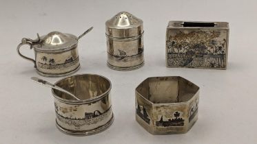A collection of Middle Eastern white metal and Niello items to include a napkin ring, vesta case,